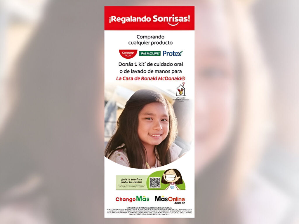 Afiche de la campaña Regalando Sonrisas con la foto de una niña sonriente, impulsada por Colgate, Casa Ronald y GDN Argentina