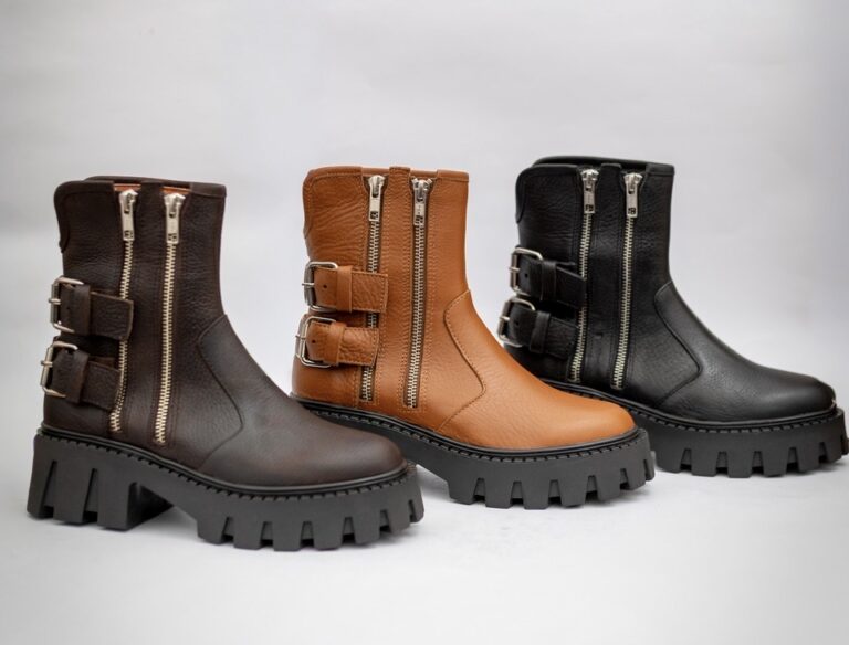 Borcegos de cuero vacuno Lara Ferre en colores negro, suela y chocolate, con cierres metálicos, hebillas laterales y suela tractor para uso urbano